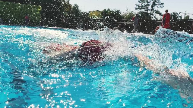 Swimming freestyle in slow motion by Professional woman athlete