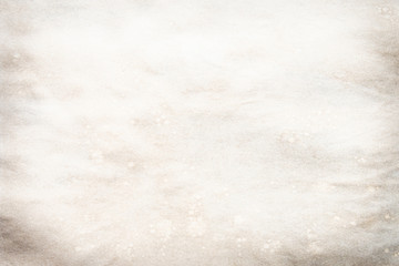 Old brown and white paper stained with coffee. Vintage abstract background.