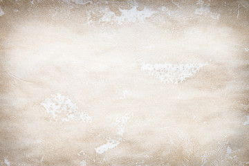 Old brown and white paper stained with coffee. Vintage abstract background.
