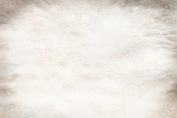 Old brown and white paper stained with coffee. Vintage abstract background.