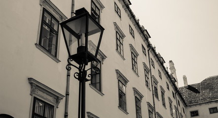 Fototapeta na wymiar Amazing photo of an old historic building with nice aesthetic lamp