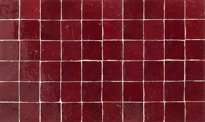 Old retro dark brown ceramic tile texture background. Dark brown square tiled wall.