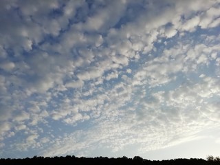 Large sky with waves of clouds.