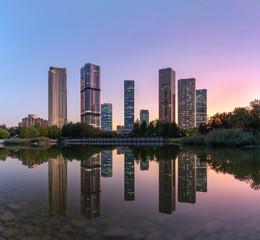 Lakeside modern office building reflection on the water