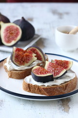 Sandwich with figs and honey,  cream cheese,honey and bread slice