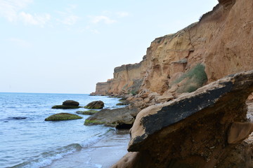 Fototapeta na wymiar blue sea cliffs wild beaches high cliffs