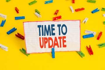 Conceptual hand writing showing Time To Update. Concept meaning act updating something someone or updated version program Colored clothespin papers empty reminder yellow floor office