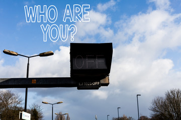 Conceptual hand writing showing Who Are You question. Concept meaning asking about demonstrating...