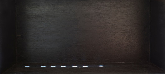 Black room scene with empty space