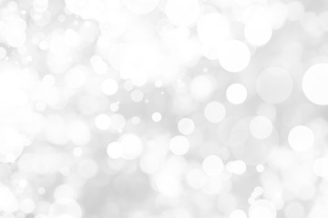 Abstract background with White bokeh on gray background. christmas blurred beautiful shiny Christmas lights.