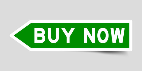 Label sticker in green color arrow shape as word buy now on white background