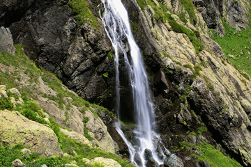 Fototapeta na wymiar Waterfall near Lake Okhodje (2543 m). The Caucasus