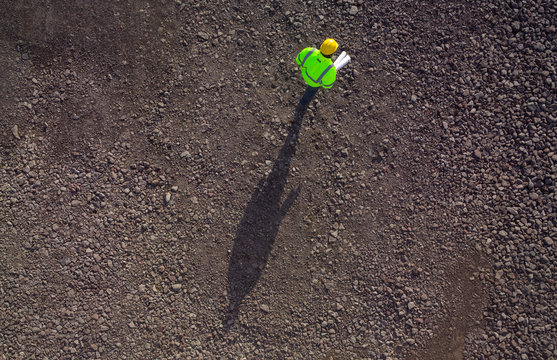 Construction Worker From Above On Gravel Photographed