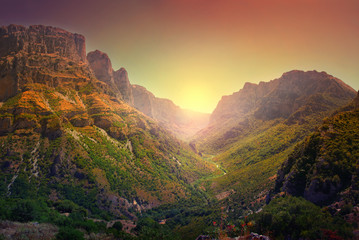 A breathtaking panoramic view of the Vikos Gorge, listed as the deepest gorge in the world by the Guinness Book of Records