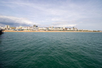 Naklejka na ściany i meble Brighton UK, 10th July 2019: The famous beautiful Brighton Beach and Seafront showing the coastline area on a bright sunny day,