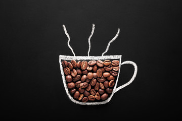 coffee cup drawn with chalk on blackboard with coffee beans