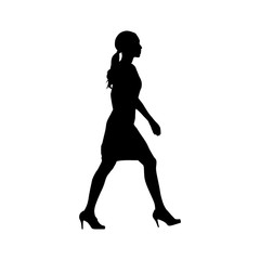 Fototapeta na wymiar Woman walking, side view. Isolated vector silhouette. Young businesswoman in formal clothing