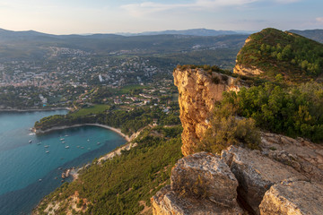 Fototapeta na wymiar Cap Canaille cliffs overlooking Gulf of Cassis at Mediterranean Sea coast of French riviera at sunset light