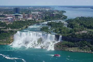 Niagara Falls, New York, USA: Aerial view of the American and Bridal Veil Falls, Goat Island, the Niagara River, and the city of Niagara Falls.