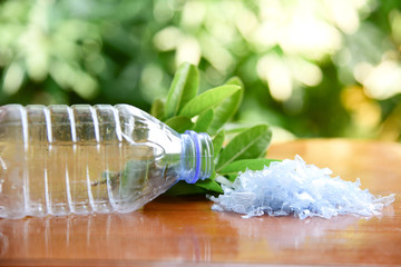 PET plastic bottle with bottle flakes.Recycle &Save the environment concept