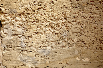 antique stone wall masonry on a city street