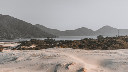 Sunrise at the beach with white sand and footsteps - Brazillian Dune