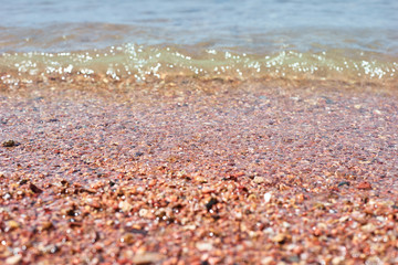 Sea or ocean waves on a stone coast beach