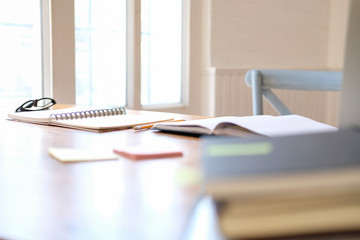 notebook stationary on library desk. back to school learning education concept © 88studio