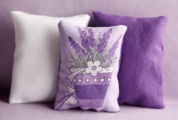 Purple pillows with lavender decoration