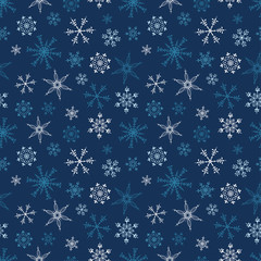 Fun hand drawn snowflakes seamless pattern - beautiful seasonal christmas background, great for banners, wallpapers, invitations, cards, wrapping paper - vector surface design