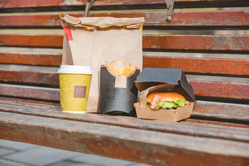 burger in box with fry potatoes coffee cup. fast food