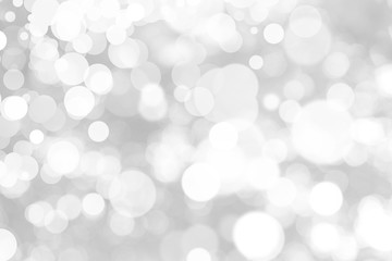 Abstract background with White bokeh on gray background. christmas blurred beautiful shiny Christmas lights.