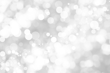 Abstract background with White bokeh on gray background. christmas blurred beautiful shiny Christmas lights.