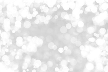 Abstract background with White bokeh on gray background. christmas blurred beautiful shiny Christmas lights.