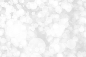 Abstract background with White bokeh on gray background. christmas blurred beautiful shiny Christmas lights.