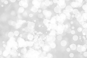 Abstract background with White bokeh on gray background. christmas blurred beautiful shiny Christmas lights.