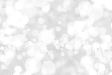 Abstract background with White bokeh on gray background. christmas blurred beautiful shiny Christmas lights.