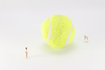 Tiny toys play tennis on the big tennis © Seaonweb