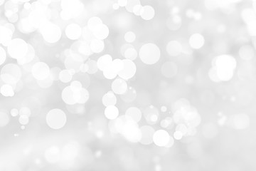 Abstract background with White bokeh on gray background. christmas blurred beautiful shiny Christmas lights.