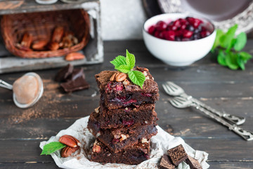 Chocolate brownie with berries and nuts