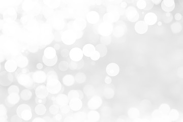 Abstract background with White bokeh on gray background. christmas blurred beautiful shiny Christmas lights.