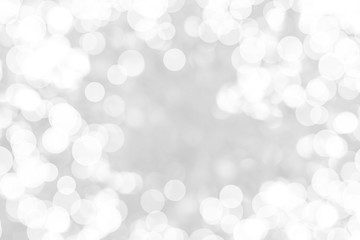 Abstract background with White bokeh on gray background. christmas blurred beautiful shiny Christmas lights.