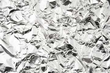 Foil silver crumpled metal aluminum texture background surface decoration backdrop design photo hi...