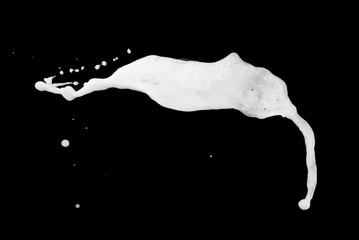 White bubble foam splash explosion in the air on black background,freeze stop motion photo object design