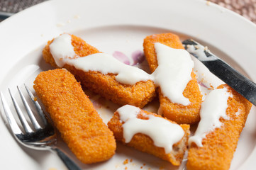 Fish sticks with mayonnaise.Healthy food