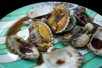Fresh and Delicious boiled blood cockles, focus selective.