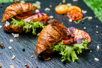 Croissant With Salmon And Greens