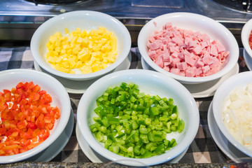 Vegetables, tomatoes, corn and onions for salads