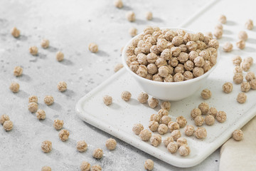 Wheat bran in a white vase. Healthy diet