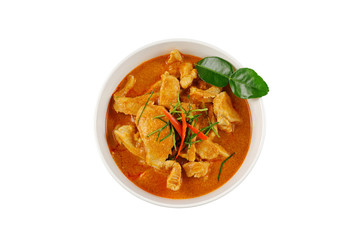 Panaeng Curry with chicken breast in bowl on white background